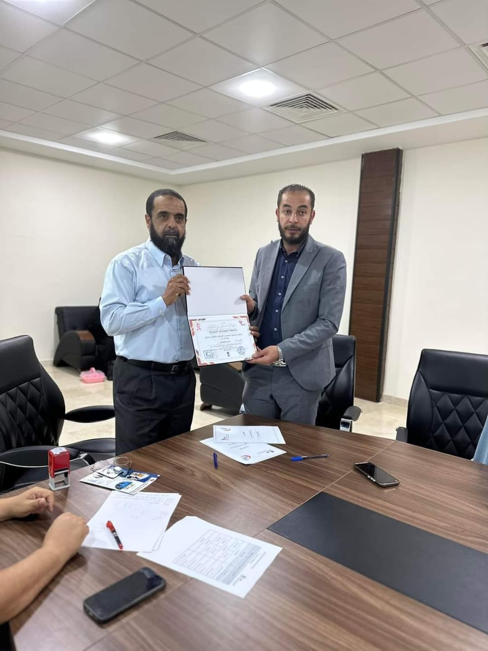 The signing of a cooperation agreement between the International Maaref University and the Health Services Administration in Janzour.